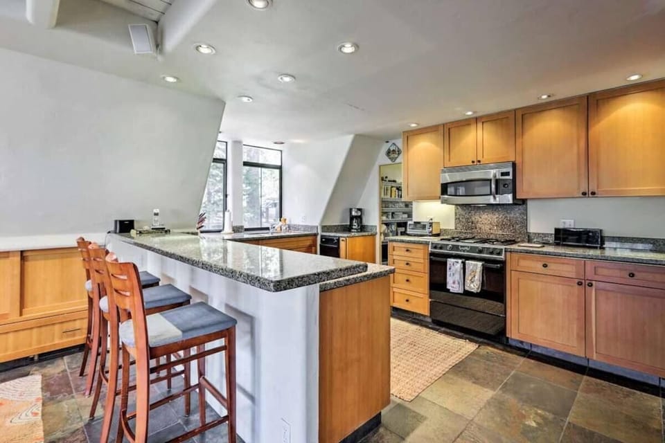 Full kitchen with garnet countertops 
