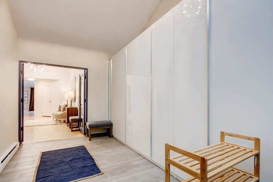 Bright, open hallway with mountain charm and warm natural light.