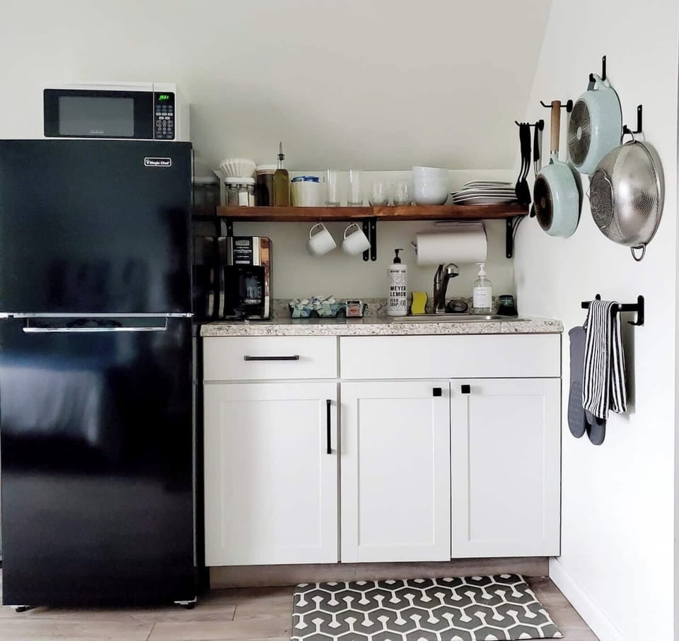Kitchen is equipped with the basics you need to cook a meal. Cooking sources are an electric two burner top (not shown) and a microwave.