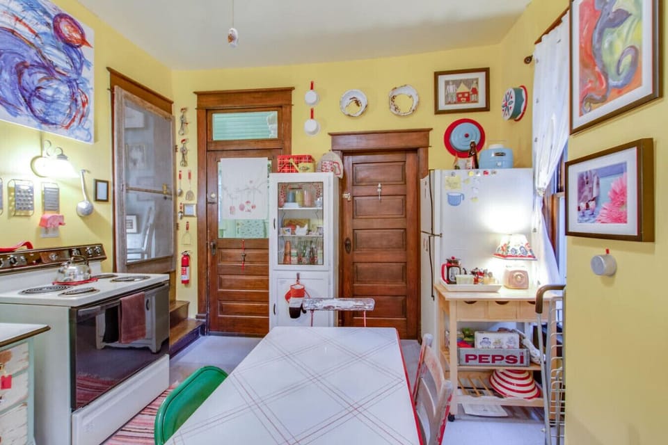Whip up a meal in the eclectic kitchen full of color and character.