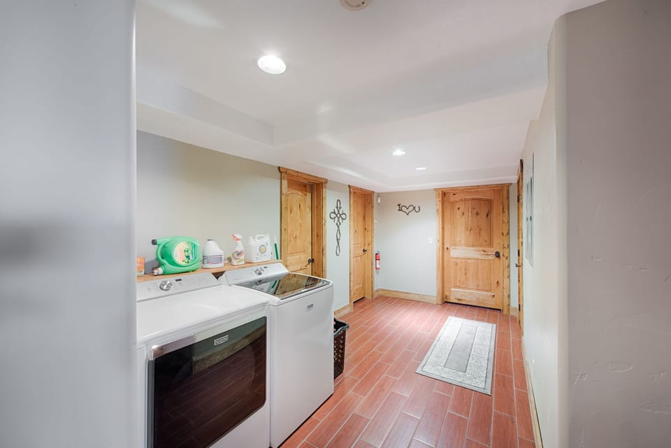 Lower level laundry.  2nd washer and dryer upstairs.