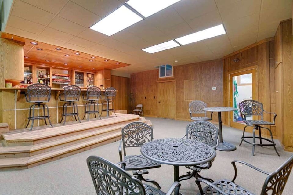 Full size meeting room and bar adjacent to pool.