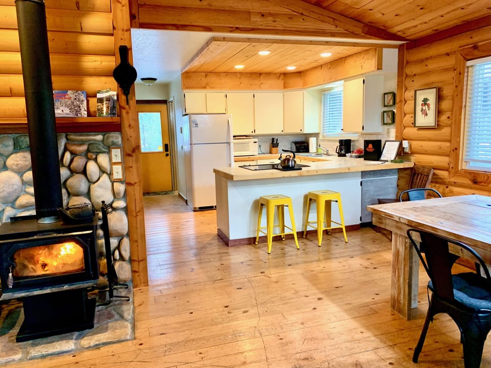 Open concept between dining, living, and kitchen