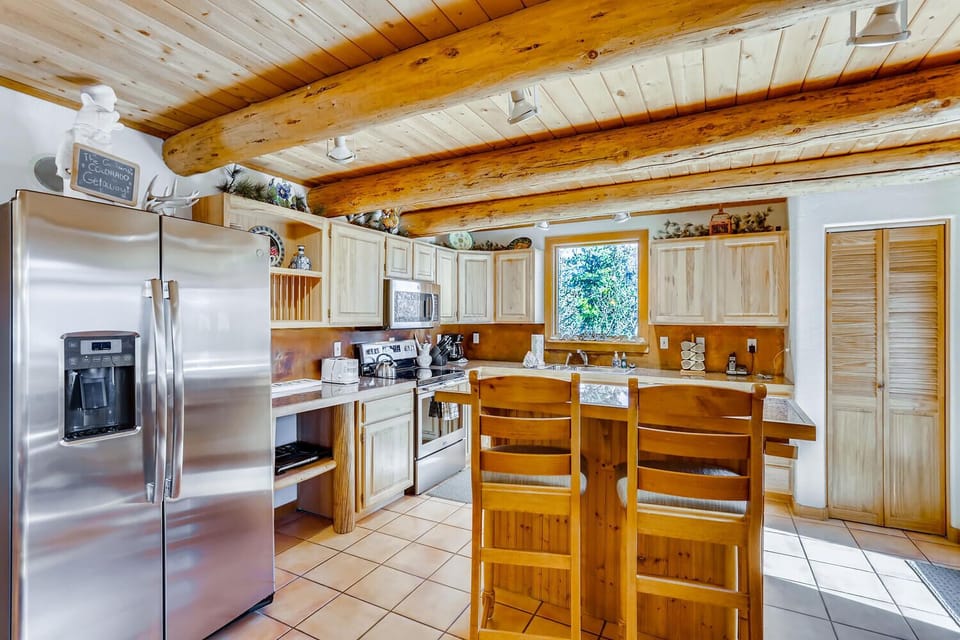 Large Kitchen has room for all the chefs in your group while allowing those not so fortunate in the kitchen to still be a part of the action.