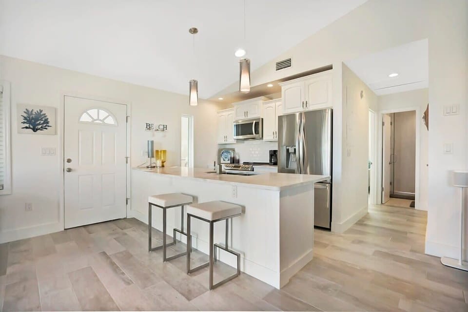 Bar top counter seating in the kitchen.