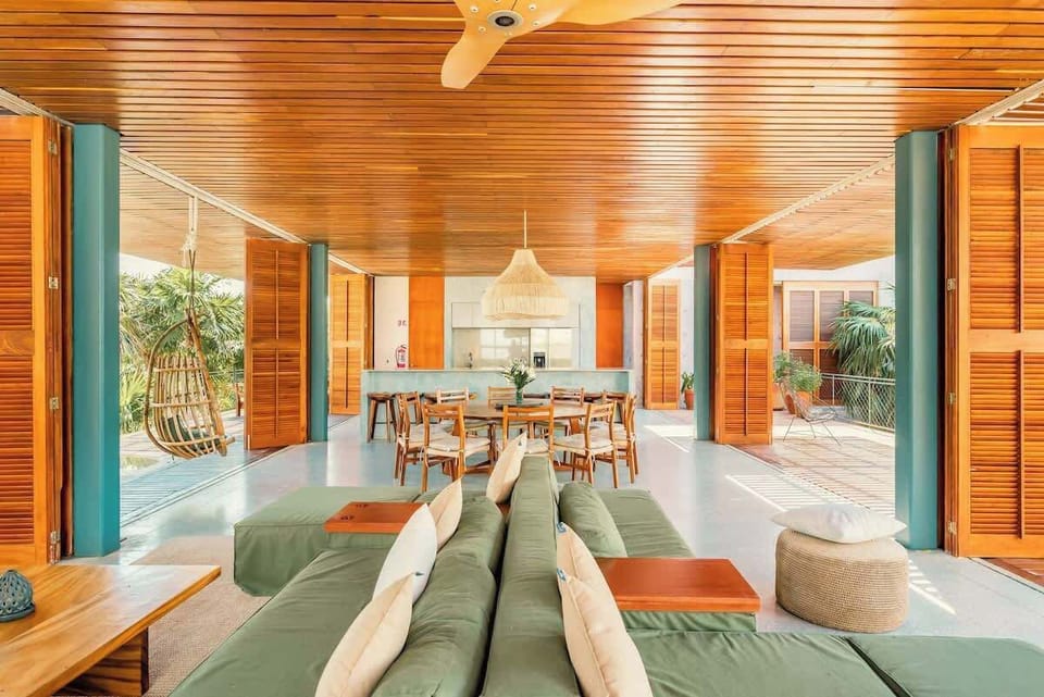 Full view of the living room, dining room and kitchen.