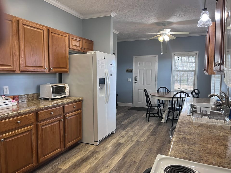 Kitchen with breakfast table. 
Side door (with code entry)