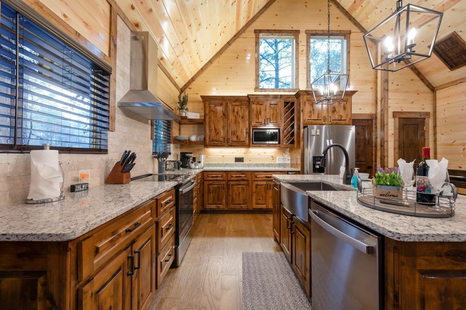 Fully stocked kitchen with granite countertops.