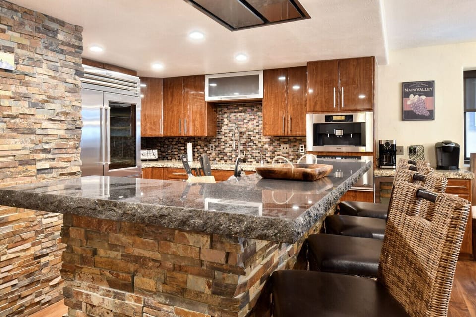 Beautiful Stone Breakfast Bar Seating for Four on Main Level (2nd)