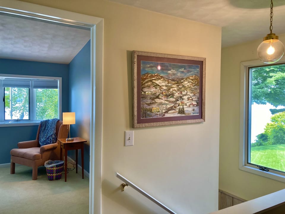 View of the master bedroom and Lakeview window from upstaIrs.