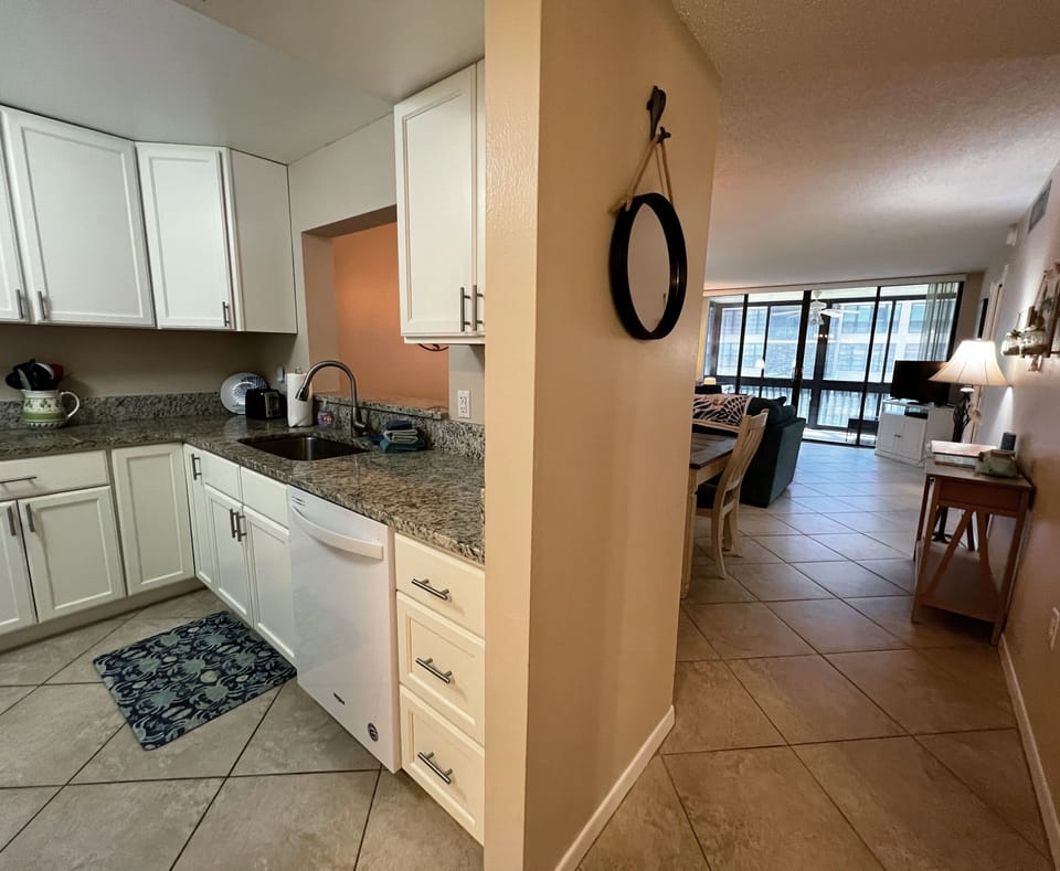 Entrance into this second floor condo with two separate master s - Entrance into this second floor condo with two separate master suites and a full kitchen.
