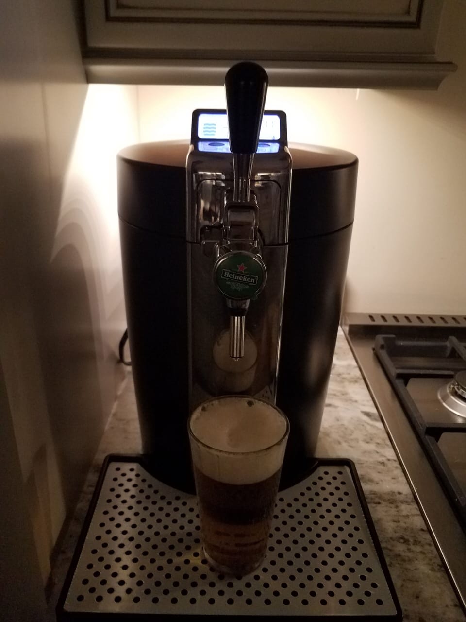 Heineken beer dispenser in kitchen