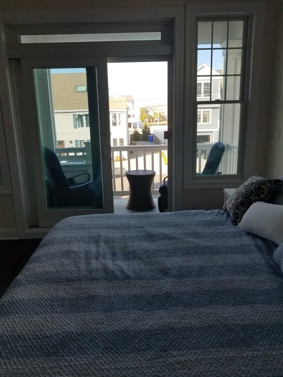 Master suite king size adjustable bed looking towards deck