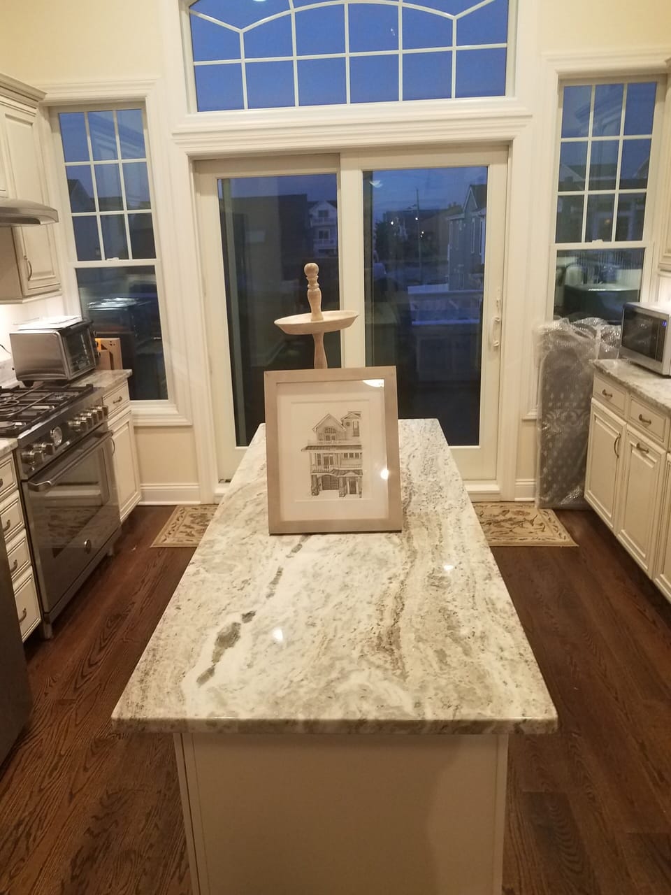 Chef's kitchen with Bertazzoni stove/oven.  Fully furnished.