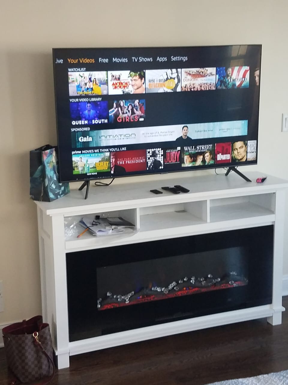 55 inch Samsung Smart TV with Firestick and fireplace electric fireplace stand