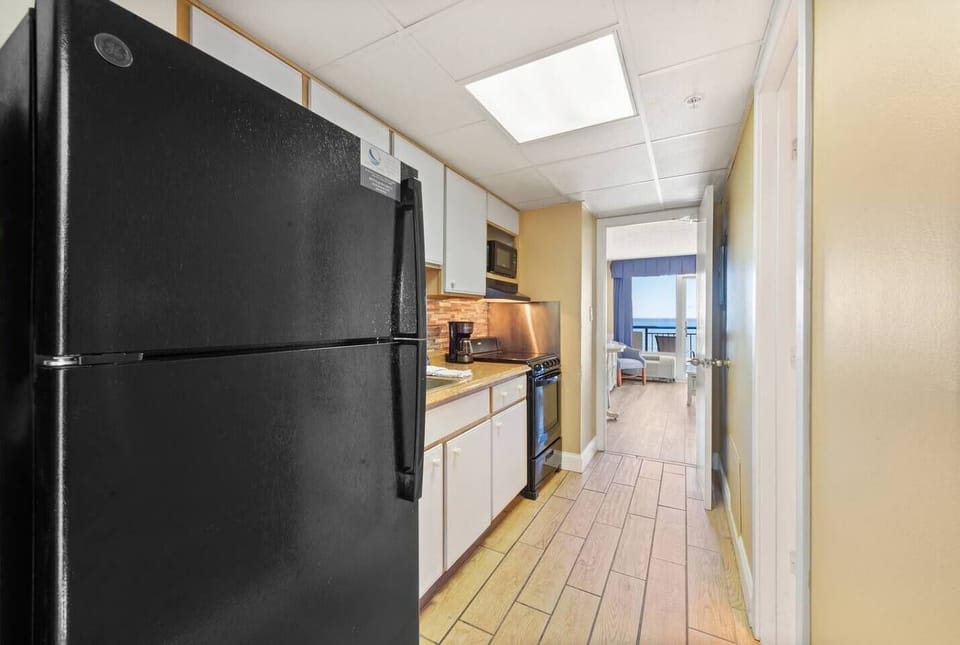 Savor the taste of coastal living in this beautifully designed kitchen!