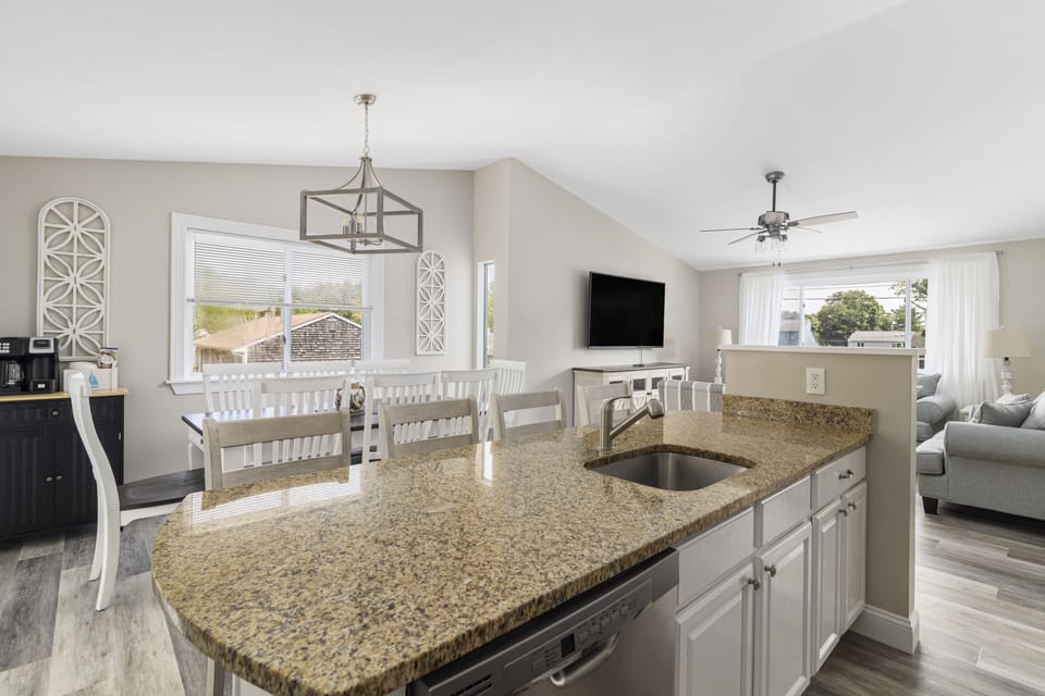 Kitchen, dining room, upstairs living room: all open concept.