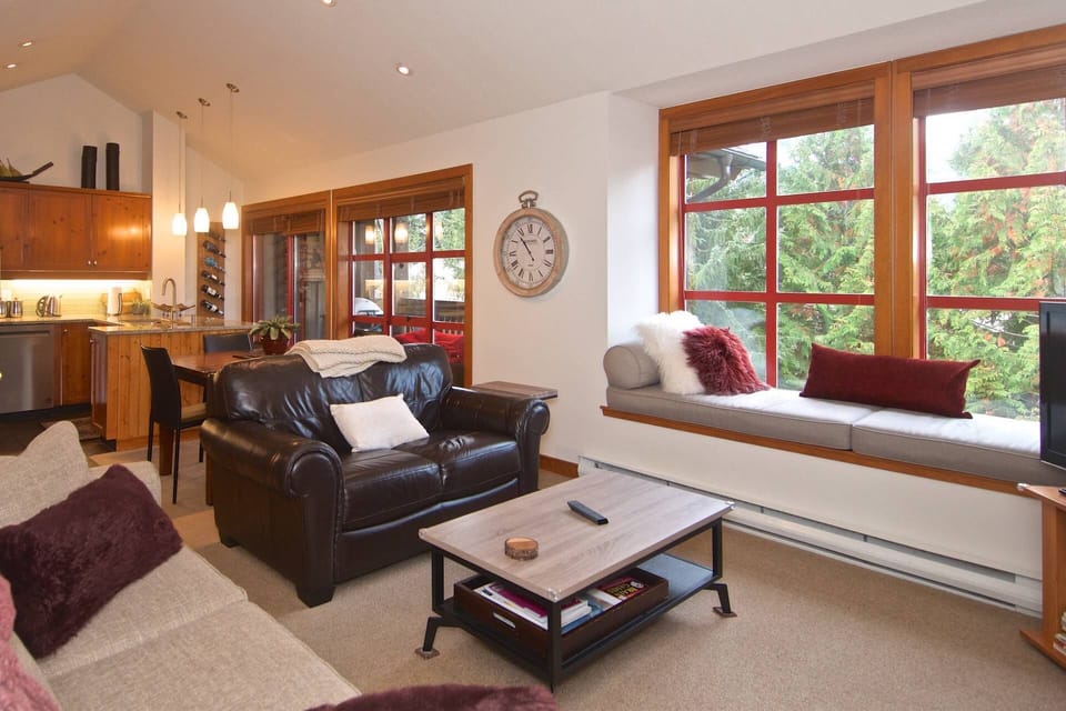 Living area with love seat and Sofa Bed