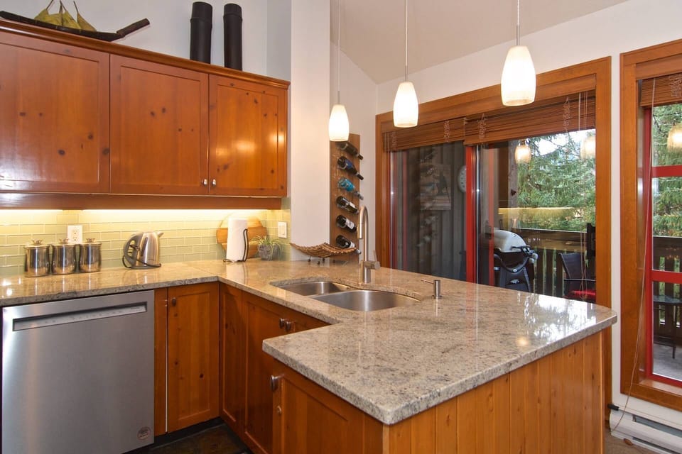 Bright kitchen with full access to patio