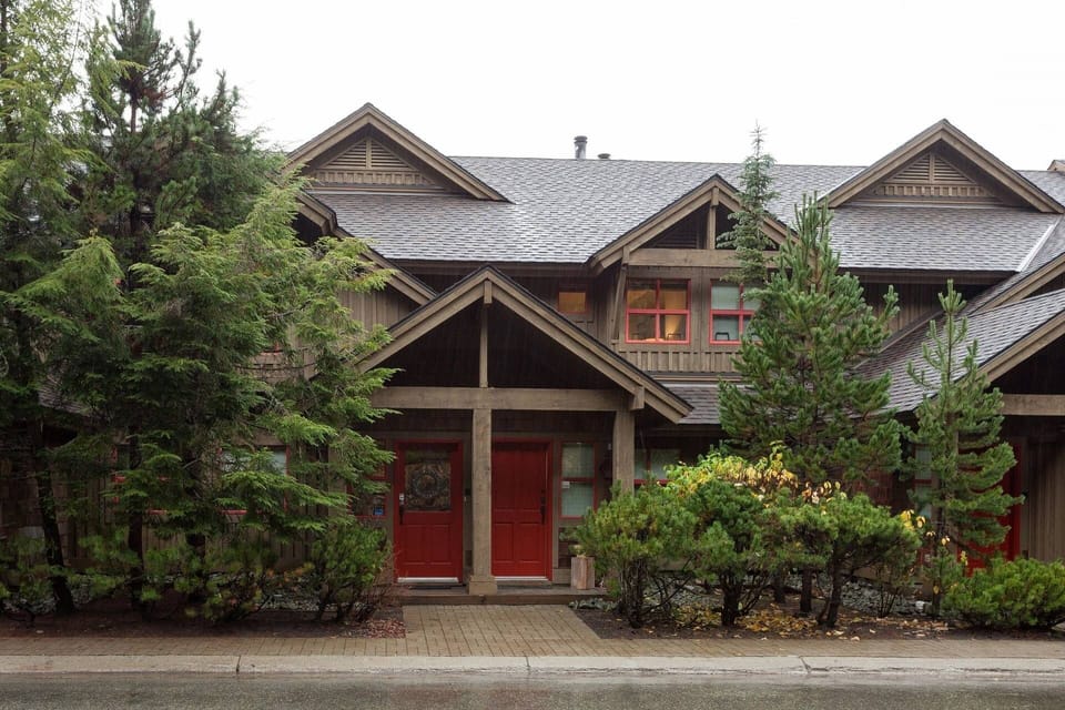 The Woods unit 24. Main floor foyer leads to upper level main living townhouse