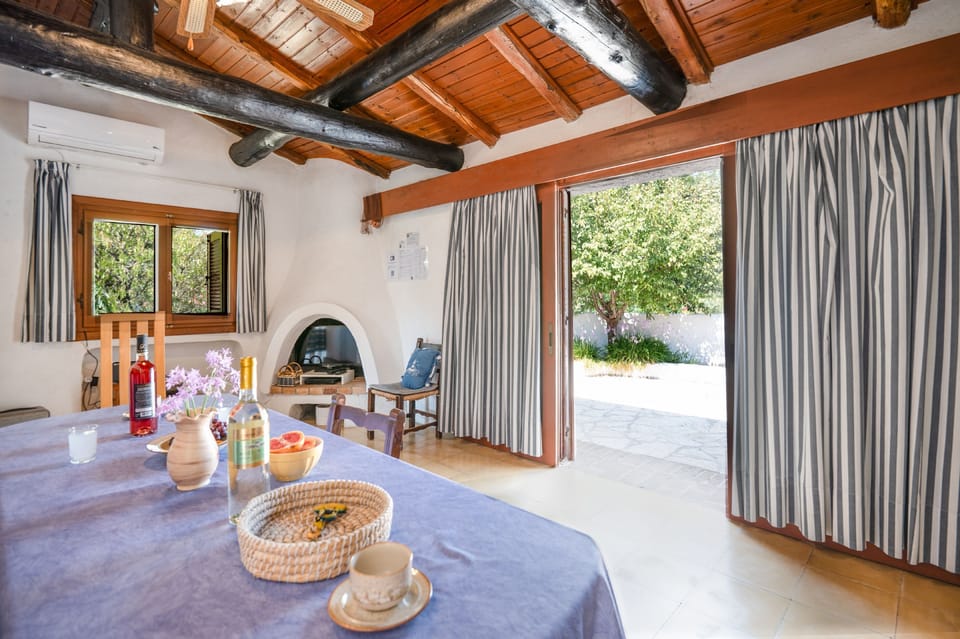 Dining and living area with direct access to patio