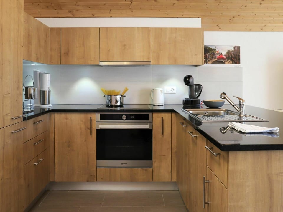 Tap, Sink, Kitchen Sink, Cabinetry, Countertop, Plumbing Fixture, Kitchen Stove, Kitchen Appliance, Kitchen, Wood