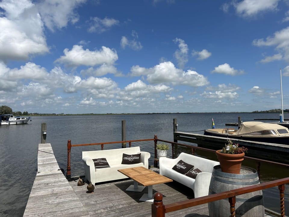 Body Of Water, Waterway, Furniture, Lake, Dock, Chair, Boat, Deck, Outdoor Furniture, Watercraft