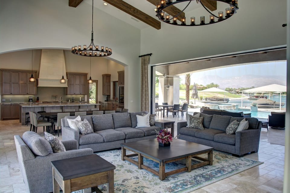 Spacious, open-concept living, dining and kitchen area that fully opens to the outdoors