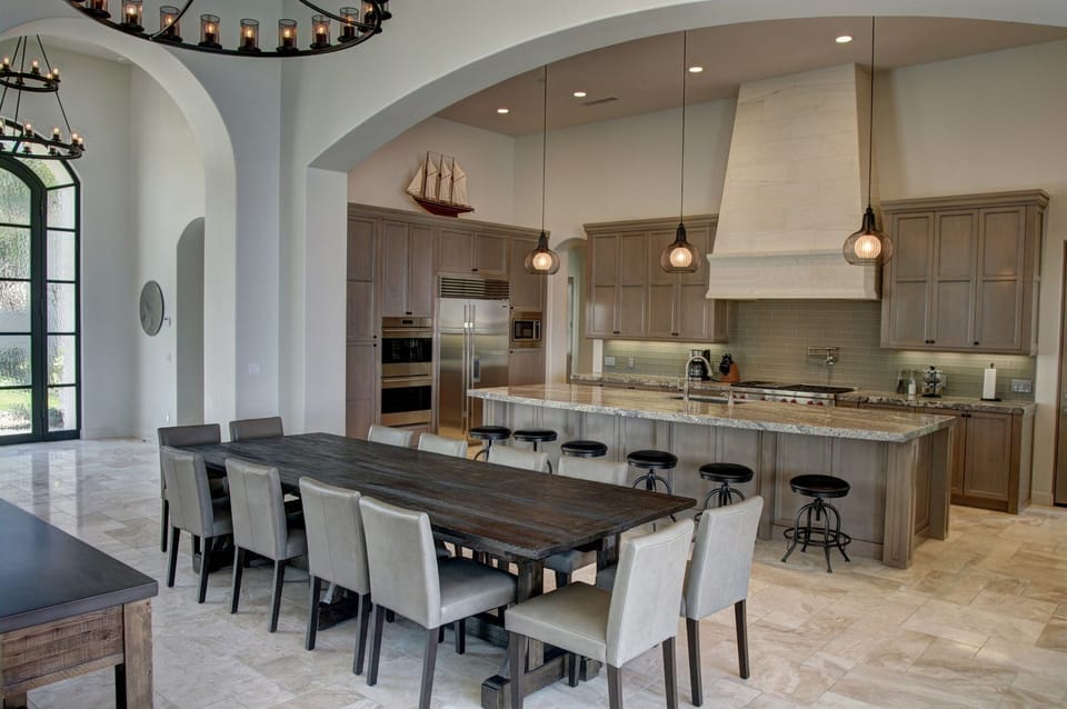 Chef's kitchen with top line appliances. Seating for 6 at the large kitchen island and traditional dining for 10.
