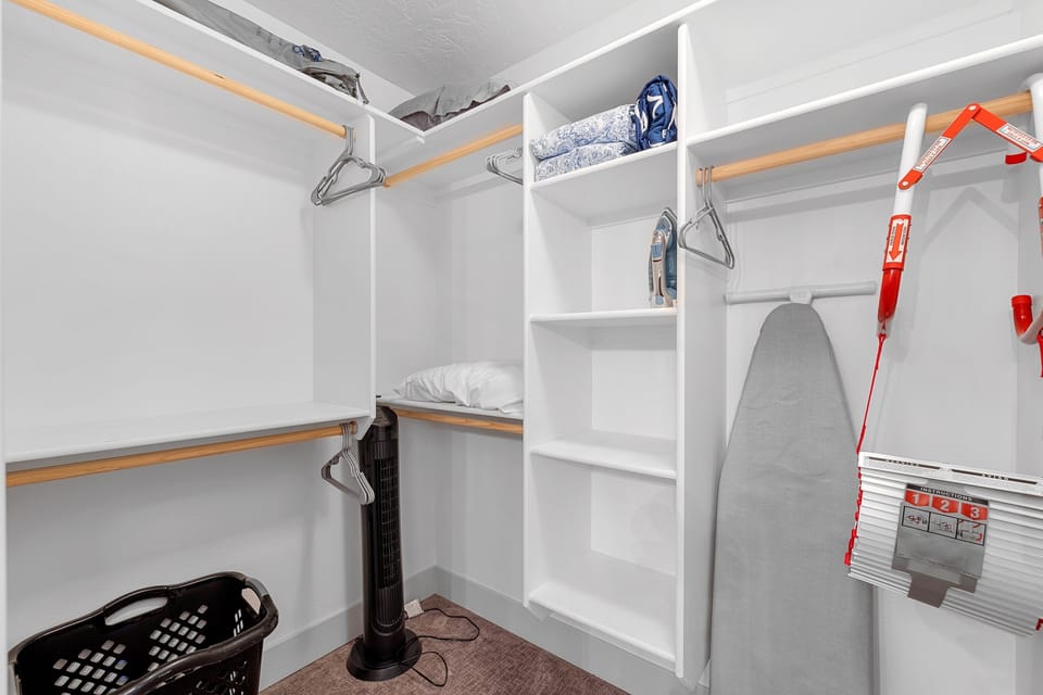 The Highland Hangout- The third floor master suite walk-in closet.