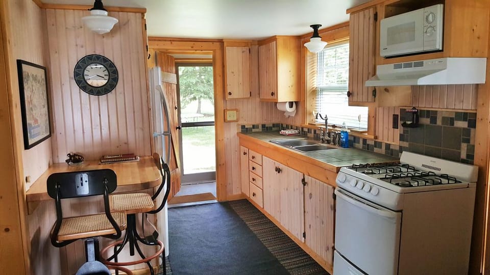 Kitchen with every thing you  need to cook a feast. 