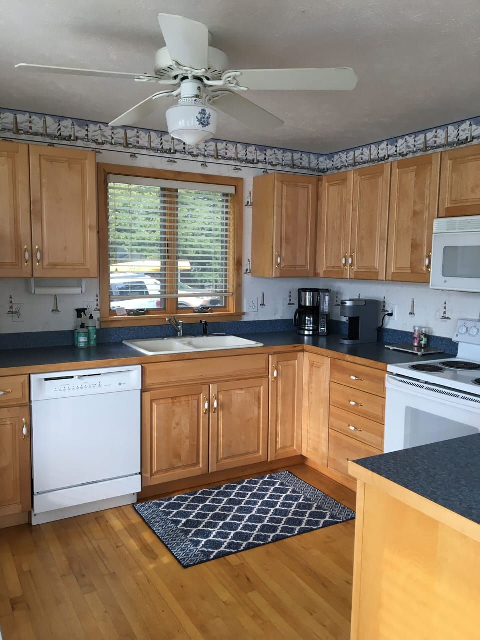 Fully equipped kitchen, including Keurig and Ninja coffee makers.