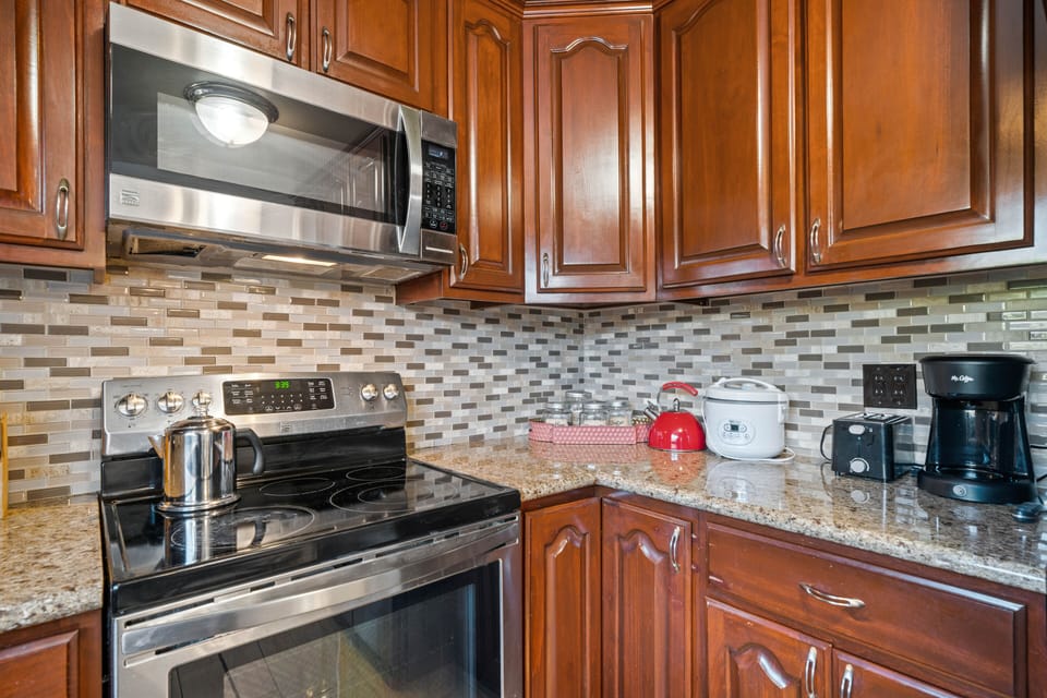 Mornings are sorted with a coveted coffee machine and stovetop kettle for tea