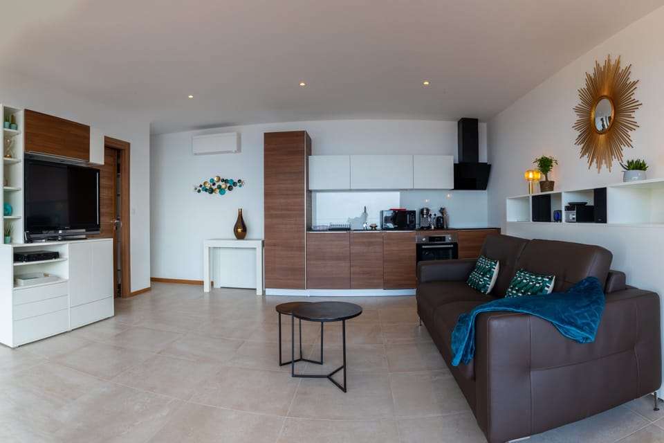Your luxurious studio is equipped to offer you a pleasant stay with a 55-inch flatscreen TV, a DVD player, a stereo system, and a leather couch.