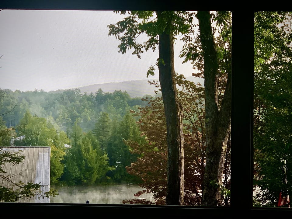 Early morning summer mist over Lake Rescue, viewed from the king bedroom