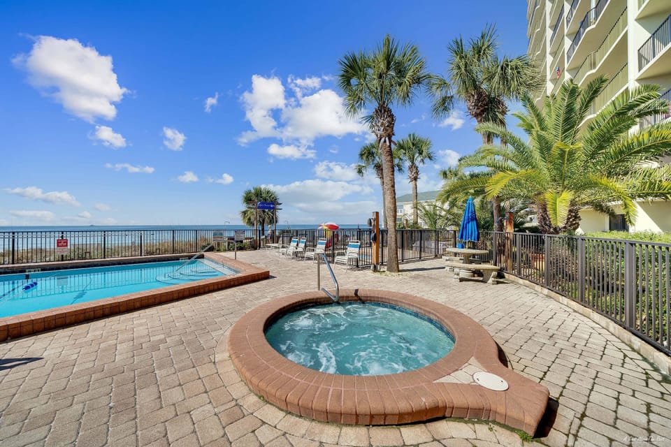 Bubble away the day in the beachside hot tub, palm trees swaying and the Gulf just steps beyond the fence.