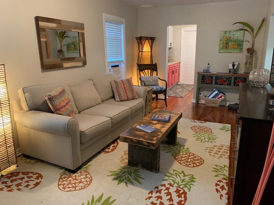 Living room with queen sleeper sofa.