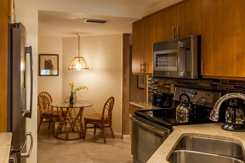 Spacious kitchen with all that is needed to cook a home cooked meal.