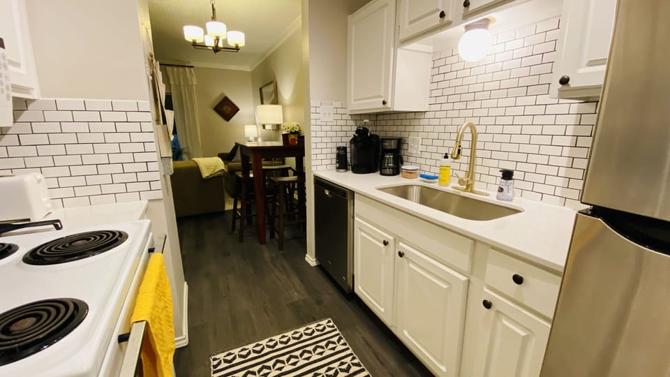 Fully equipped with cookware, bakeware, tableware, utensils, mixer, and blender