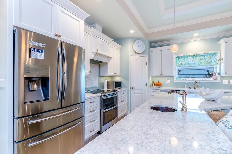 Thoughtfully designed with upscale appliances and stylish coastal details throughout.