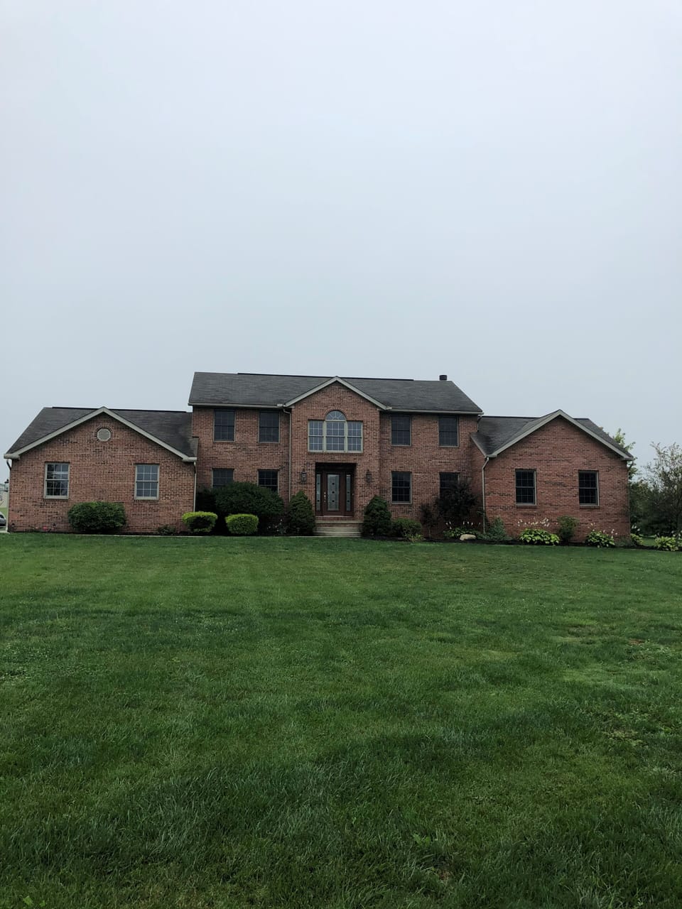 300 foot of front yard sloping down.