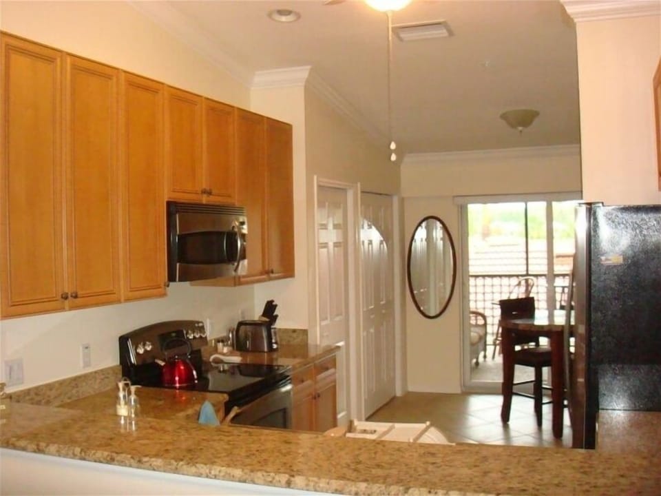 Kitchen leading out to the front lanai