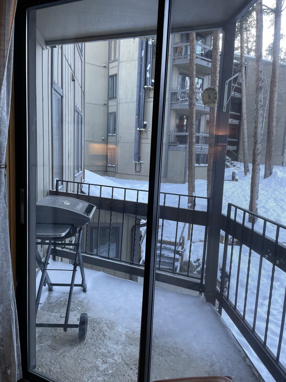 Deck with gas grill.