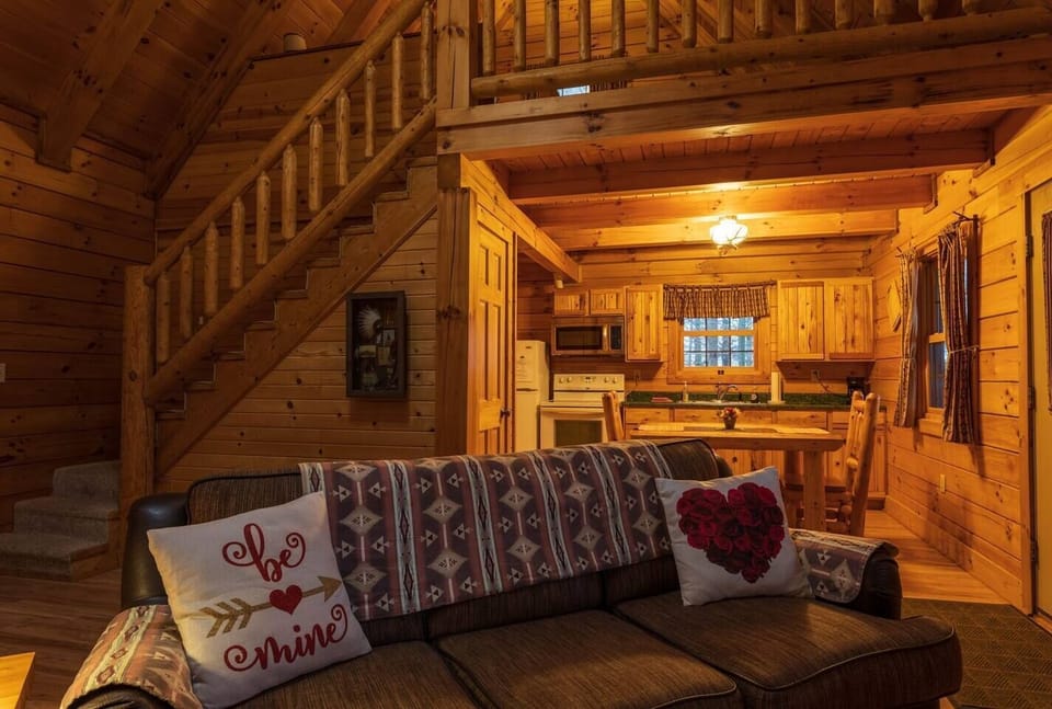 Ascend to the loft, where a queen-size bed promises cozy evenings with your significant other.