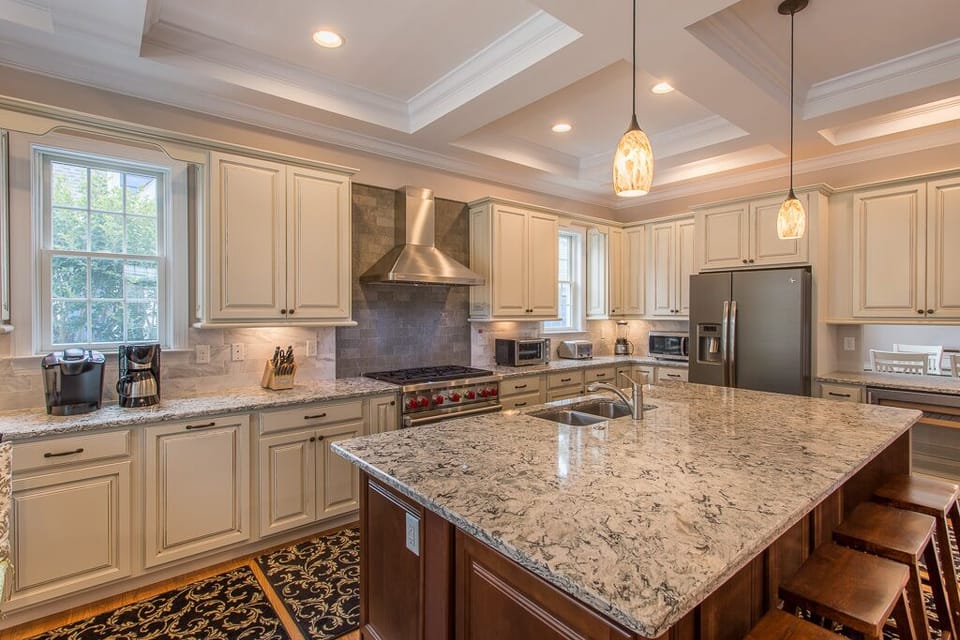 Gourmet kitchen with over-sized island (quartz countertop).