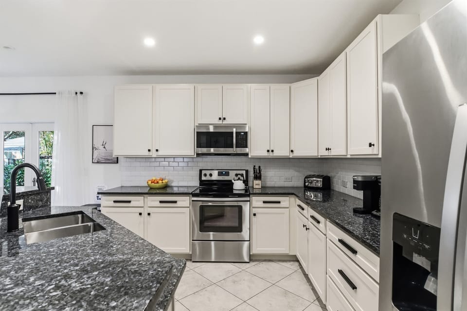 Well stocked, spacious chef's kitchen in the main house.