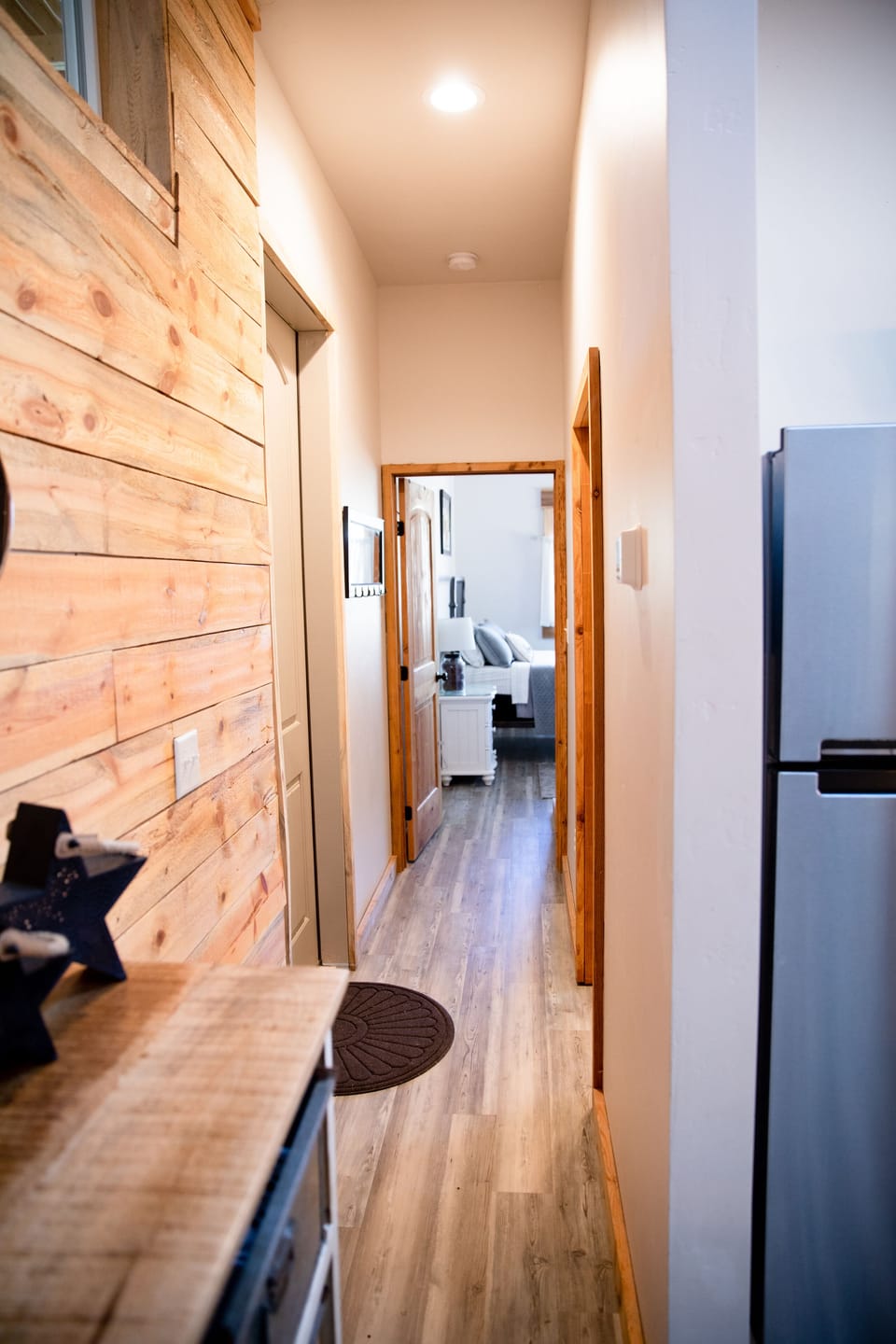 Hallway from the sitting area to bedroom/bathroom.