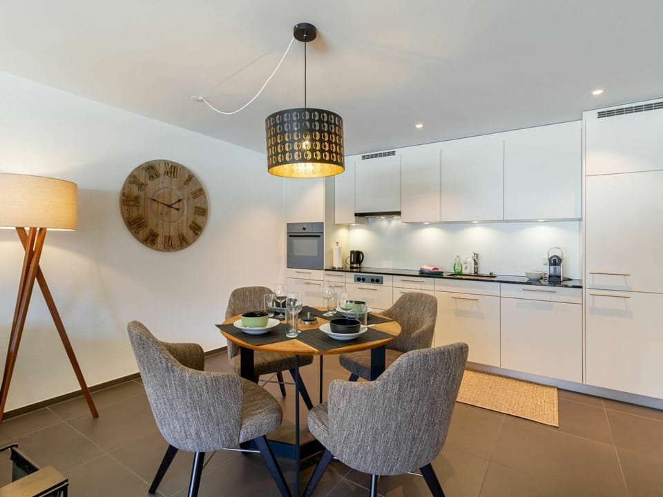 Table, Furniture, Interior Design, Chair, Lighting, Countertop, Wood, Flooring, Floor, Clock