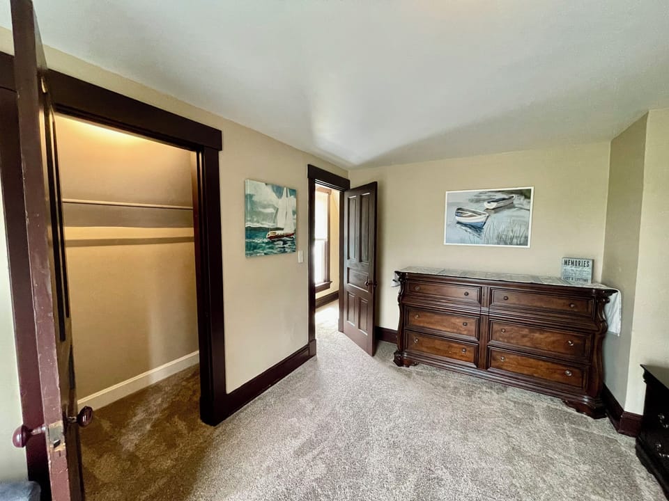 Third bedroom (upstairs) with large closet and dresser for storage