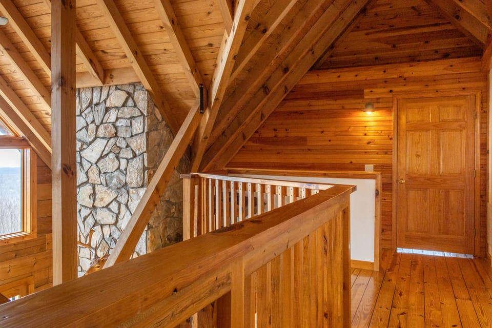 Upstairs balcony overlooks the living room.